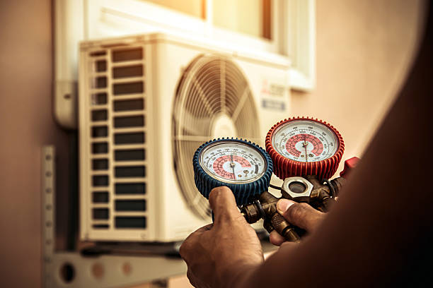 Professional Ac Installation technician working in Pelham, AL